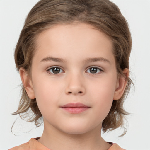 Joyful white child female with medium  brown hair and brown eyes