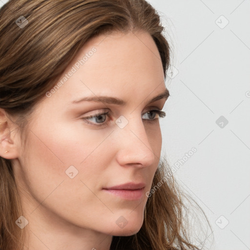 Neutral white young-adult female with long  brown hair and grey eyes