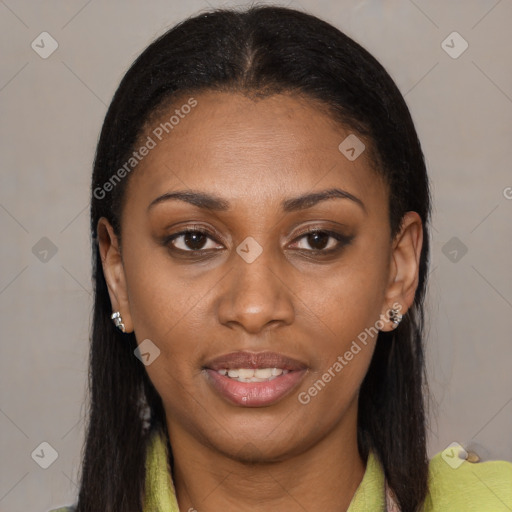 Joyful black young-adult female with long  brown hair and brown eyes