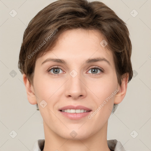 Joyful white young-adult female with short  brown hair and grey eyes