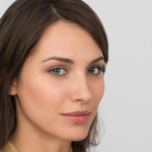 Neutral white young-adult female with medium  brown hair and brown eyes