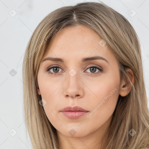 Neutral white young-adult female with long  brown hair and brown eyes