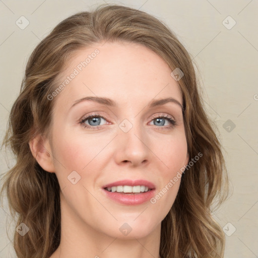 Joyful white young-adult female with long  brown hair and blue eyes