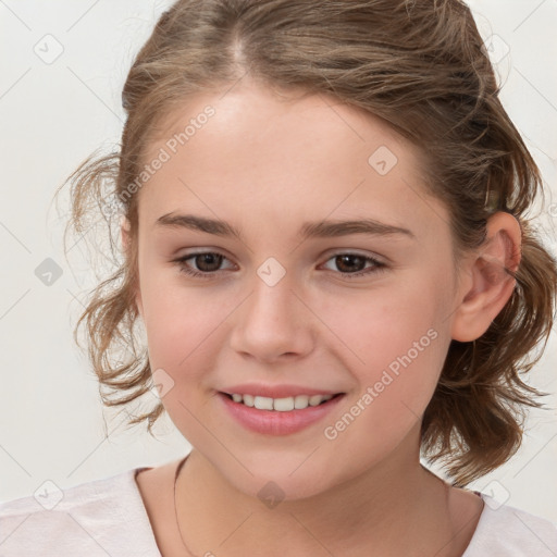 Joyful white child female with medium  brown hair and brown eyes