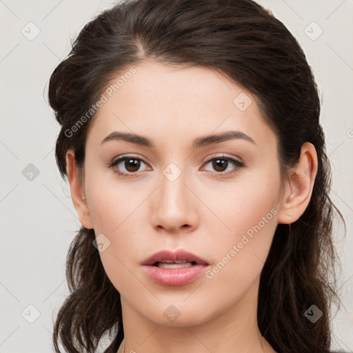 Neutral white young-adult female with long  brown hair and brown eyes