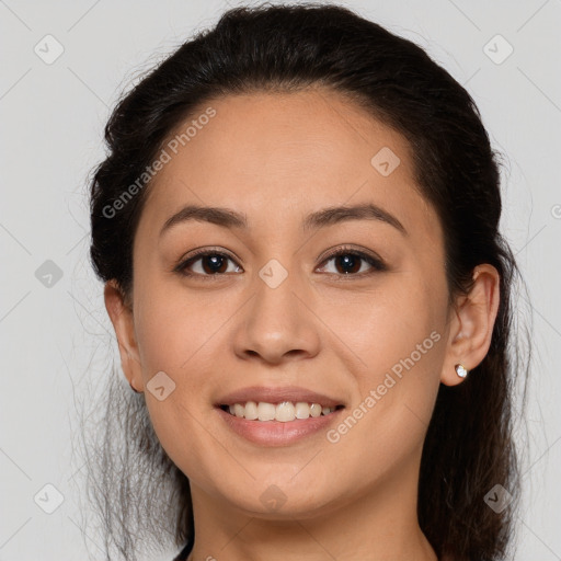 Joyful white young-adult female with long  brown hair and brown eyes