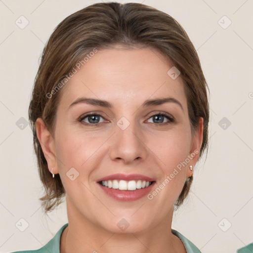 Joyful white young-adult female with medium  brown hair and green eyes