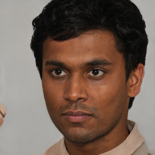 Neutral asian young-adult male with short  brown hair and brown eyes