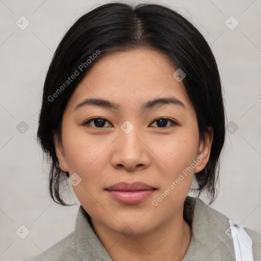 Joyful asian young-adult female with medium  black hair and brown eyes