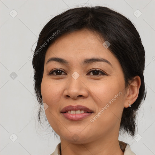 Joyful asian young-adult female with medium  brown hair and brown eyes