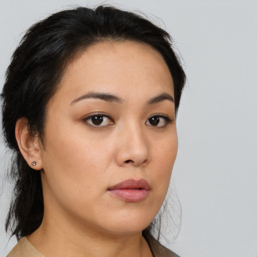 Neutral asian young-adult female with medium  brown hair and brown eyes