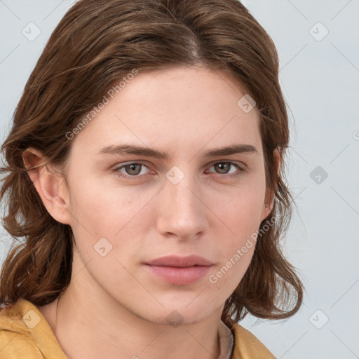 Neutral white young-adult female with long  brown hair and brown eyes