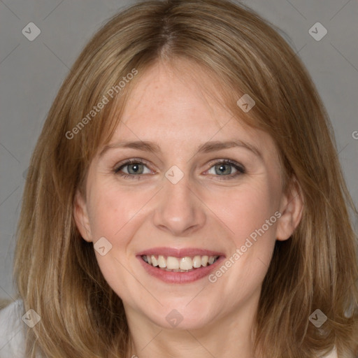 Joyful white young-adult female with medium  brown hair and blue eyes