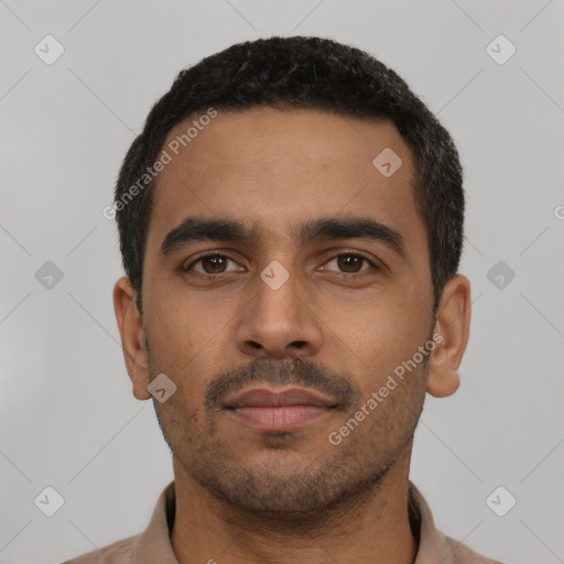 Neutral latino young-adult male with short  black hair and brown eyes
