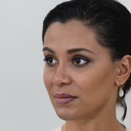 Neutral black young-adult female with short  black hair and brown eyes