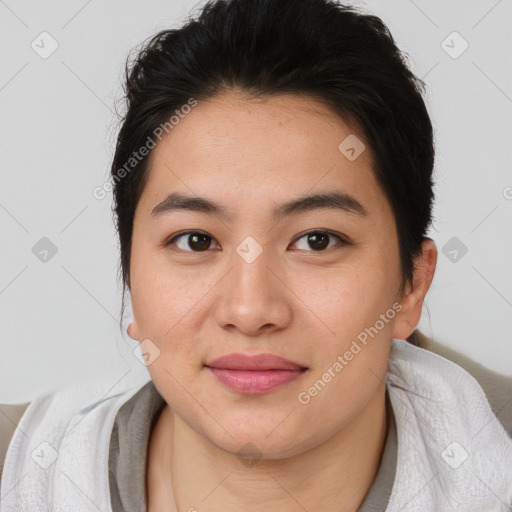 Joyful asian young-adult female with short  brown hair and brown eyes