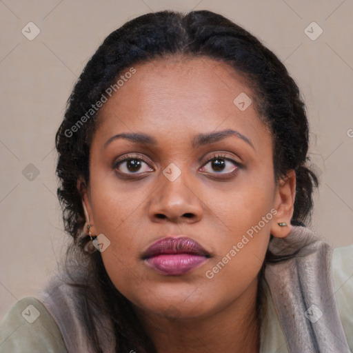 Neutral black young-adult female with long  brown hair and brown eyes