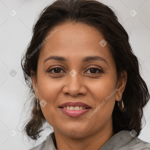 Joyful white adult female with medium  brown hair and brown eyes