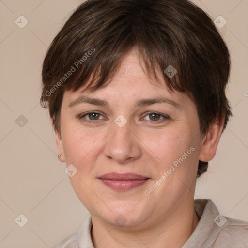 Joyful white adult female with medium  brown hair and brown eyes