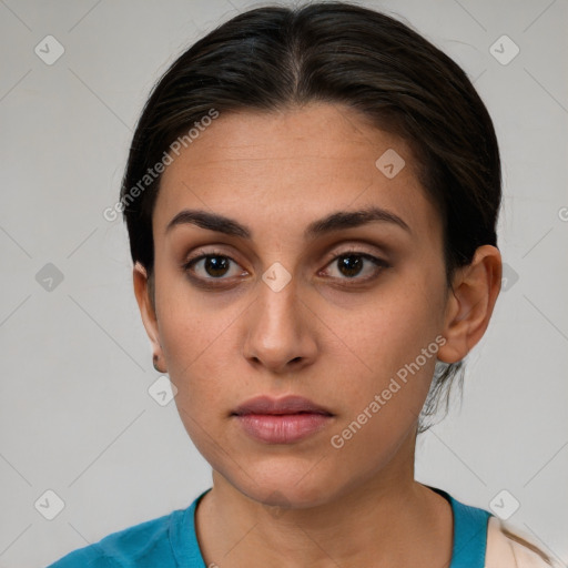 Neutral white young-adult female with short  brown hair and brown eyes