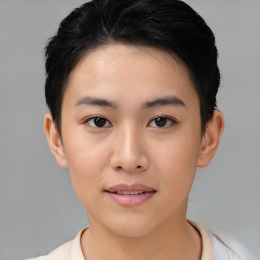 Joyful asian young-adult female with short  black hair and brown eyes