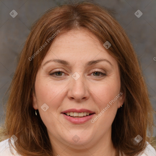 Joyful white adult female with medium  brown hair and brown eyes