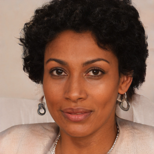 Neutral black young-adult female with short  black hair and brown eyes
