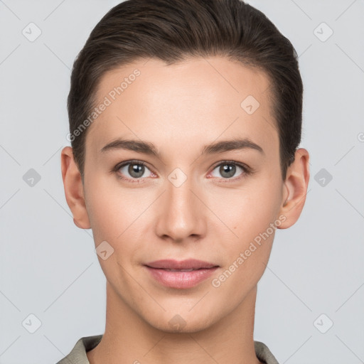 Joyful white young-adult female with short  brown hair and brown eyes