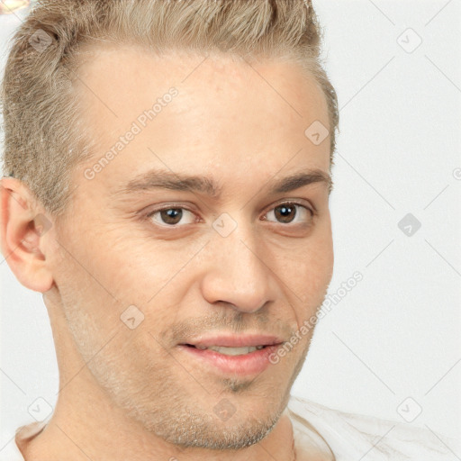 Joyful white adult male with short  brown hair and brown eyes