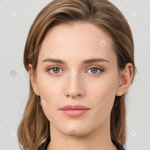 Neutral white young-adult female with medium  brown hair and green eyes