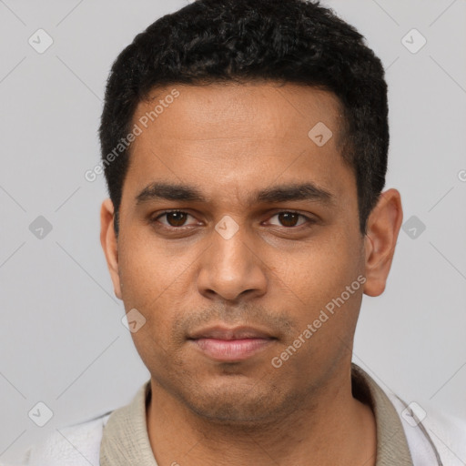 Neutral latino young-adult male with short  black hair and brown eyes