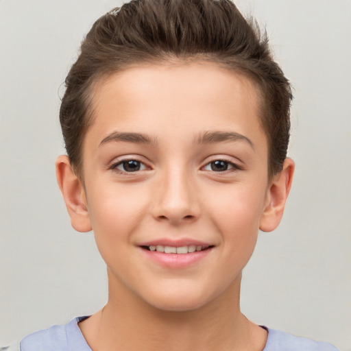 Joyful white child female with short  brown hair and brown eyes