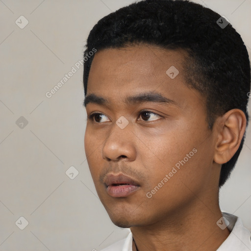 Neutral black young-adult male with short  black hair and brown eyes