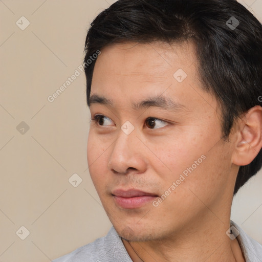 Neutral asian young-adult male with short  black hair and brown eyes