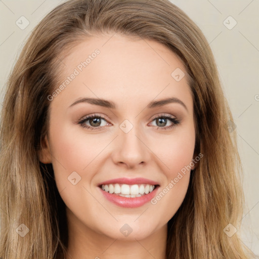 Joyful white young-adult female with long  brown hair and green eyes