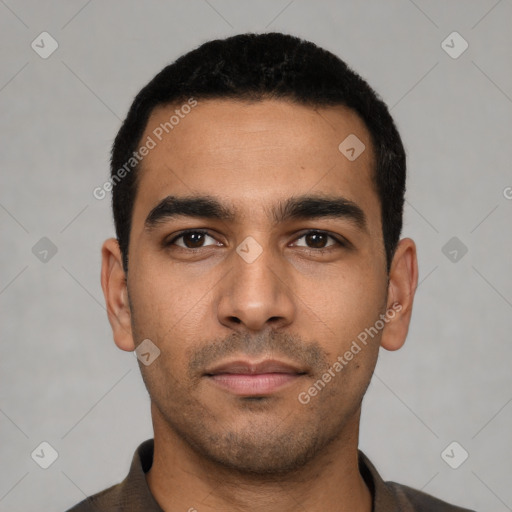 Neutral latino young-adult male with short  black hair and brown eyes