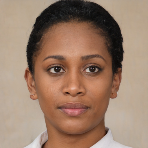 Neutral black young-adult female with short  brown hair and brown eyes