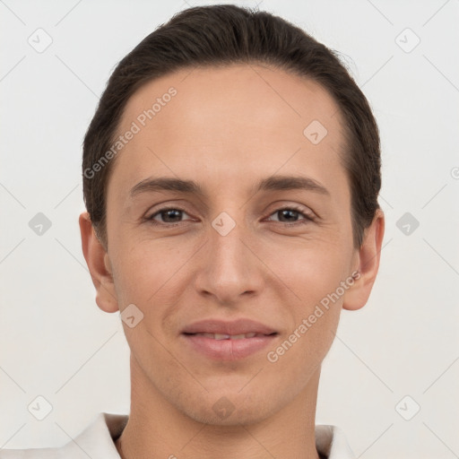 Joyful white young-adult male with short  brown hair and brown eyes