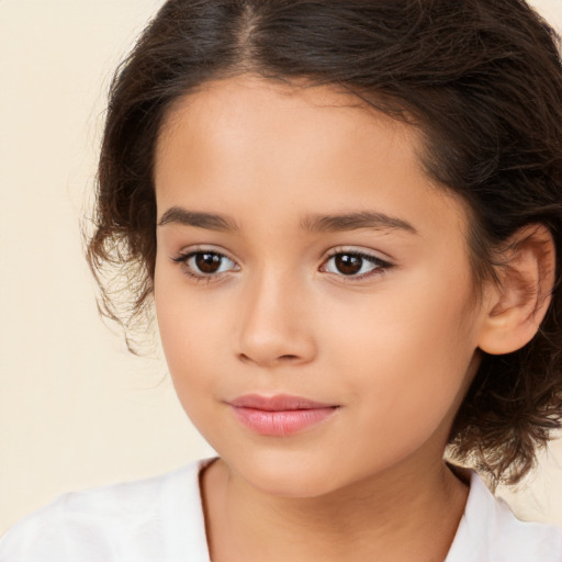 Joyful white child female with medium  brown hair and brown eyes