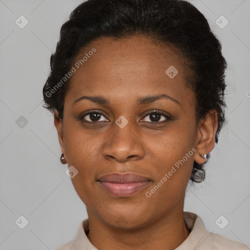 Joyful black adult female with short  brown hair and brown eyes