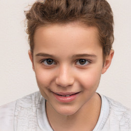 Joyful white child male with short  brown hair and brown eyes