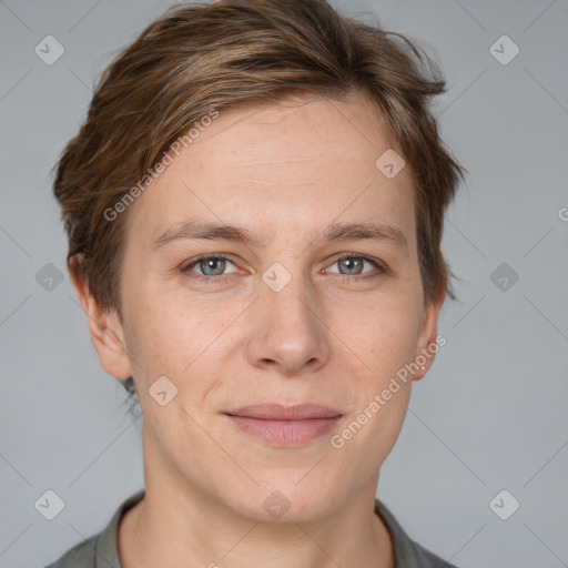 Joyful white adult female with short  brown hair and grey eyes