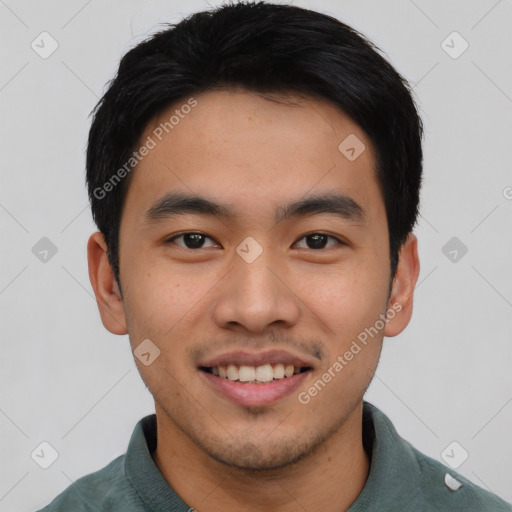 Joyful asian young-adult male with short  black hair and brown eyes