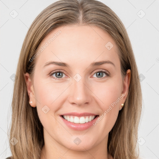 Joyful white young-adult female with long  brown hair and grey eyes