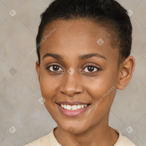 Joyful black young-adult female with short  brown hair and brown eyes