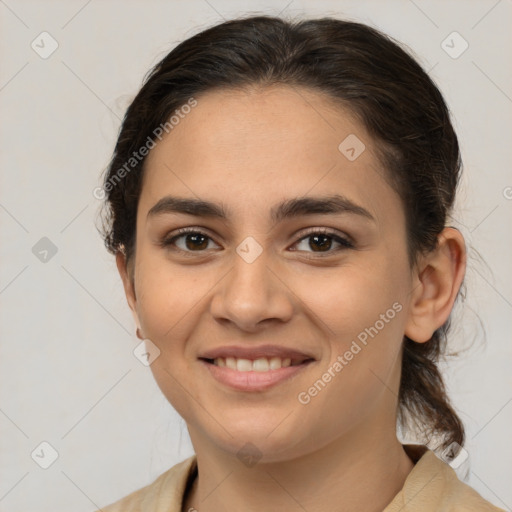 Joyful white young-adult female with medium  brown hair and brown eyes