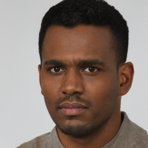 Neutral black young-adult male with short  black hair and brown eyes