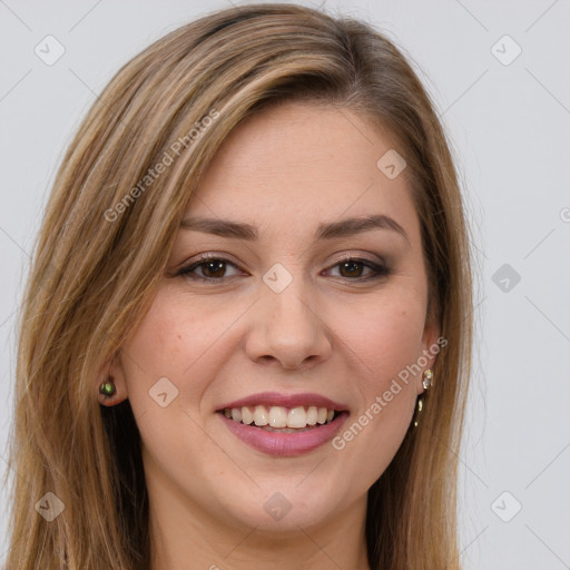 Joyful white young-adult female with long  brown hair and green eyes