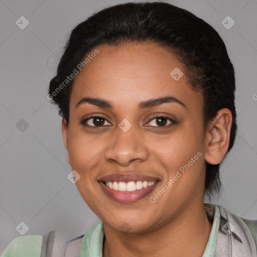 Joyful latino young-adult female with short  black hair and brown eyes