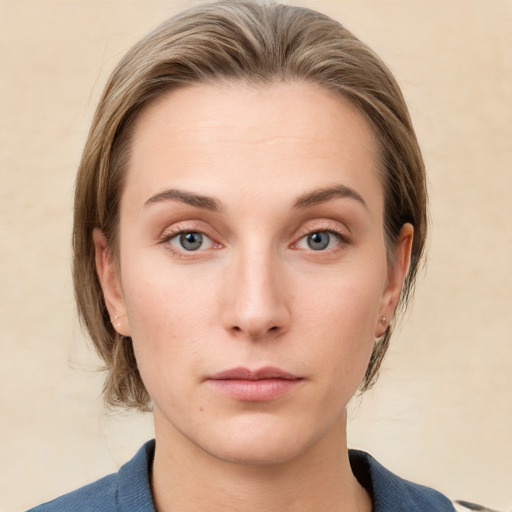 Neutral white young-adult female with medium  brown hair and grey eyes